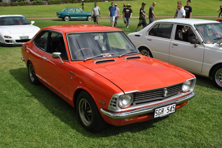 Toyota KE20 Corolla with vintage mags and blow-thru turbo.JPG