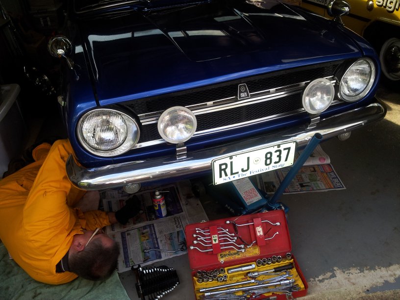 14 Gundowringa Ave - front yard - 12 July - Bruno fitting new balljoint in shed.jpg