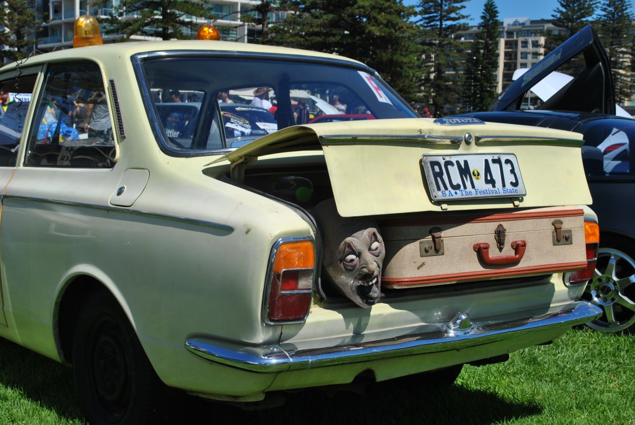 Toyota Corolla KE20 sedan with scary head in boot.JPG