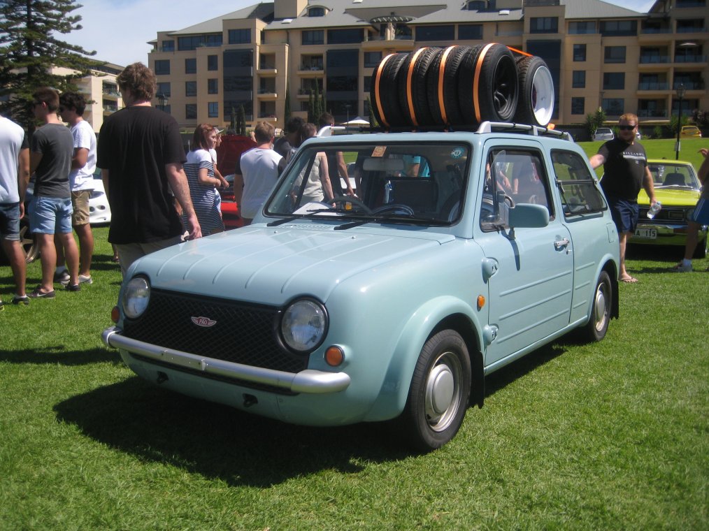 Nissan Pao with rims on roof - 01.JPG