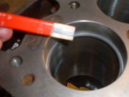 Checking ring end gaps with hi tech depth gauge.jpg