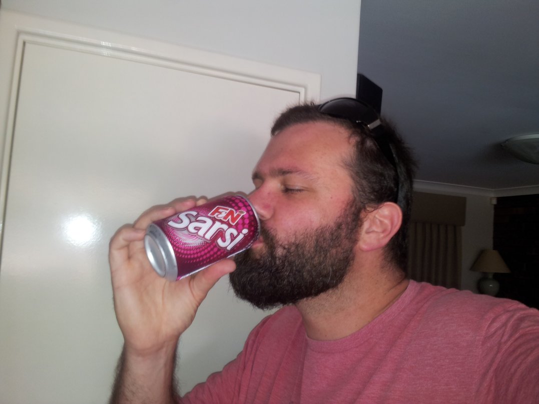 31 August - 06 - kitchen - David drinking Sarsi.jpg